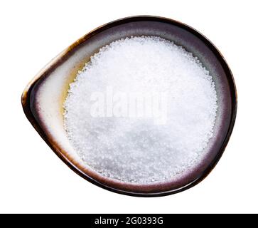 top view of fructose sugar sweetener in ceramic bowl isolated on white background Stock Photo