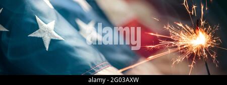 Close-up Of Vintage American Flag With Sparkler And Smoke - Fourth Of July Background Stock Photo