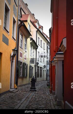 A colourful narrow old town street in Riga, Latvia (2020) Stock Photo