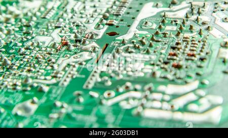 Electronic printed circuit board with soldered contacts on the reverse side of the parts Stock Photo