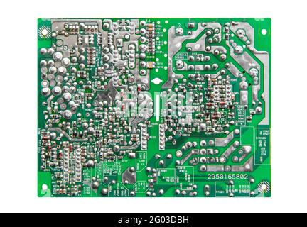 Electronic printed circuit board with soldered contacts on the reverse side of the parts. Isolated on white background. Stock Photo