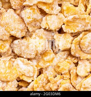 square food background - raw sugar coated cornflakes close up Stock Photo