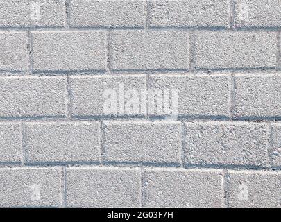 Abstract background of old cobblestone pavement close-up. Stock Photo