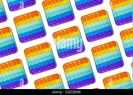 Pattern Colorful pop it toys close up. Isolate on white background. Stock Photo