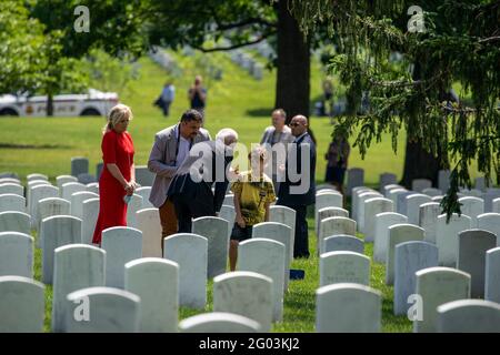 Arlington, United States. 31st May, 2021. President Joe Biden and First Lady Jill Biden stop and greet family members in section 12 at Arlington National Cemetery in Arlington, Virginia on Monday, May 31, 2021. President Biden also laid a wreath at the Tomb of the Unknown Solider before speaking at the 153rd National Memorial Day Observance. Photo by Tasos Katopodis/Pool/Sipa USA Credit: Sipa USA/Alamy Live News Stock Photo
