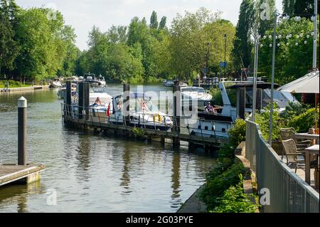 Maidenhead, Berkshire, UK. 31st May, 2021. Thames Valley Police have reported that a woman's body has been recovered in the River Thames at Boulters Lock today at 7.15am. It has been reported in the press that the body was found by a walker near to the Boathouse Restaurant. The woman has yet to be identified and the death is being treated as unexplained. Boulters Lock closed around 8am this morning and reopened just before 5pm when a queue of waiting boats were allowed through the lock again following the Police investigation. Credit: Maureen McLean/Alamy Live News Stock Photo