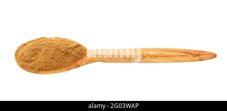 wooden spoon with cinnamon powder isolated on white background Stock Photo