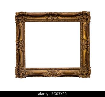 ancient dark ornamental picture frame with cut out canvas isolated on white background Stock Photo