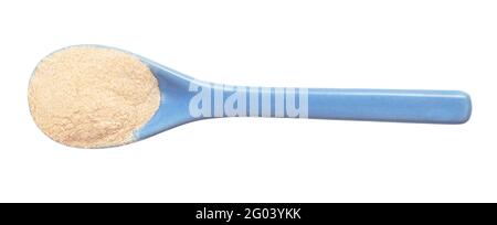 top view of apple pectin powder in ceramic spoon isolated on white background Stock Photo