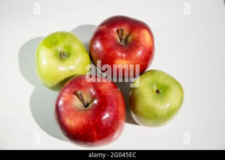 Isolated apples. Two green and two red apples isolated on white background Stock Photo