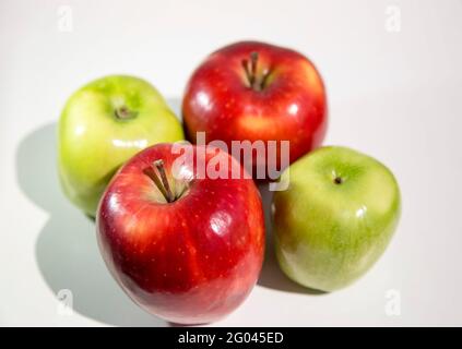 Isolated apples. Two green and two red apples isolated on white background Stock Photo