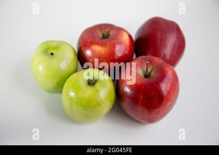 Isolated apples. Two green and two red apples isolated on white background Stock Photo