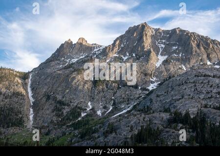 Carson Peak towers over the June Lake Loop in Mono County, CA, USA, even above Horsetail Waterfall. Stock Photo