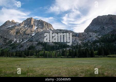 Carson Peak towers over the June Lake Loop in Mono County, CA, USA, even above Horsetail Waterfall. Stock Photo