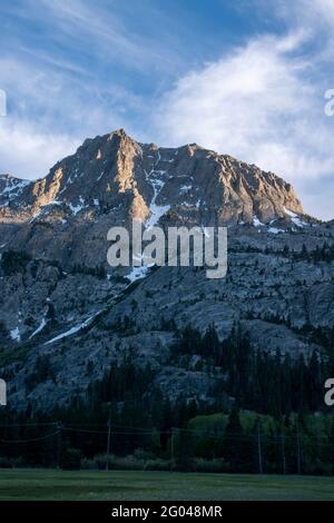 Carson Peak towers over the June Lake Loop in Mono County, CA, USA, even above Horsetail Waterfall. Stock Photo