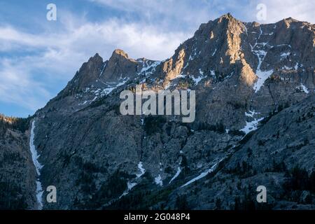 Carson Peak towers over the June Lake Loop in Mono County, CA, USA, even above Horsetail Waterfall. Stock Photo