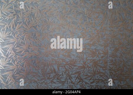 Textures, ceramic tiles for walls and floors in the form of palm leaves. Floor tiles. Tiles are dark green. Pattern in the form of leaves. Stock Photo