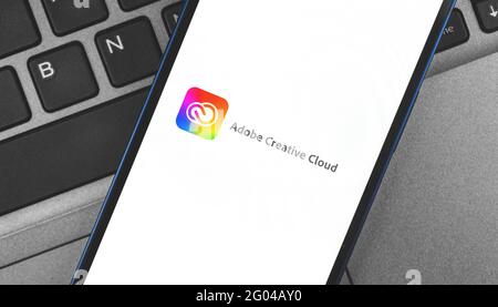 Kharkov, Ukraine - May 28, 2021: Adobe Creative Cloud app lauch title screen close up, mobile Adobe services application Stock Photo
