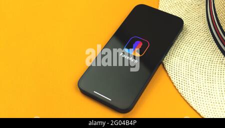 Kharkov, Ukraine - May 28, 2021: Faceapp application logo and title screen on Apple iPhone 12 Stock Photo