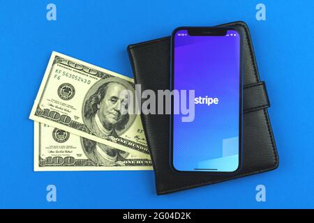 Kharkov, Ukraine - May 28, 2021: Stripe app title screen with logo displayed on Apple iPhone 12, American financial services and software application Stock Photo