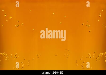 Beer textute can be usedas background. soft focus. Close up of beer with few bubbles and copy space Stock Photo