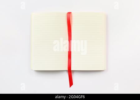 Blank notebook with bookmark on white background Stock Photo