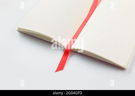 Blank notebook with bookmark on white background Stock Photo