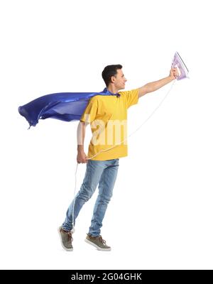 Handsome young man with iron on white background Stock Photo