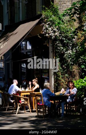 Shops and cafes, Lauriston Road, London, United Kingdom Stock Photo