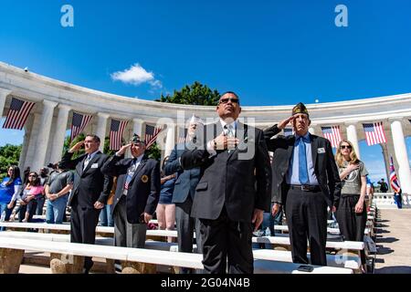 Arlington, United States Of America. 31st May, 2021. Guests and veterans salute during the National Memorial Day Observance at the Memorial Amphitheater Arlington National Cemetery May 31, 2021 Arlington, Virginia. Credit: Planetpix/Alamy Live News Stock Photo