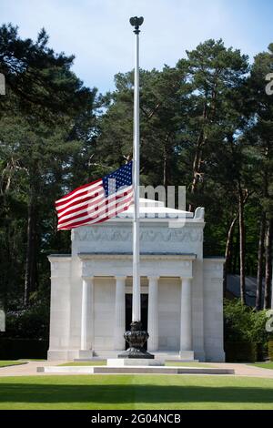 Brookwood, UK. 30th May, 2021. The U.S. flag flies at half-staff in observance of Memorial Day in front of the chapel memorial at the Brookwood American Military Cemetery, May 30, 2021 in Brookwood, Surrey, England. Brookwood is the only American Military Cemetery of World War I in the British Isles and contains the graves of 468 American war dead. Credit: Planetpix/Alamy Live News Stock Photo
