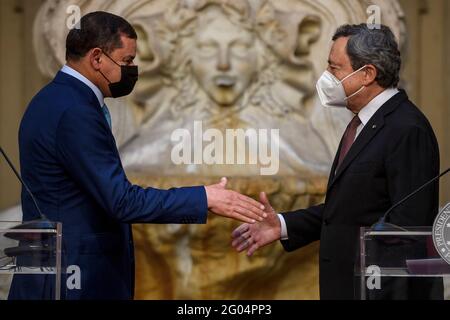 Rome, Italy. 31st May 2021. (210531) -- ROME, May 31, 2021 (Xinhua) -- Italian Prime Minister Mario Draghi (R) greets Libyan Prime Minister Abdul Hamid Dbeibah at a joint press conference in Rome, Italy, on May 31, 2021. Italy and Libya will work together on illegal immigration and renewable energies, Draghi and Dbeibah told reporters at the joint press conference after meeting here on Monday. (Pool via Xinhua) Credit: Xinhua/Alamy Live News Stock Photo