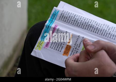 NEW YORK, NY – MAY 31: Names list of post members who passed away seen during the American Legion Boulevard Gardens 2021 Memorial Day Ceremony on May 31, 2021 in the Queens borough of New York City. Memorial Day is a federal holiday honoring military personnel who have died in performance of their military duties. Credit: Ron Adar/Alamy Live News Stock Photo