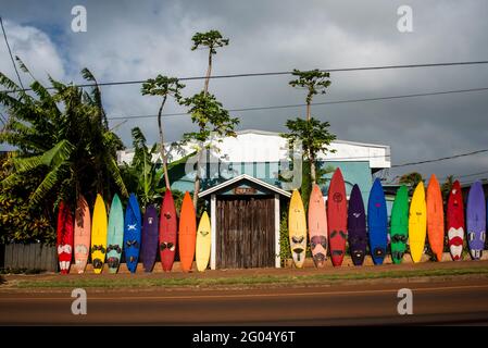 Maui, Hawaii.  A variety of different colored surfboards stand out in the beautiful evening light Stock Photo