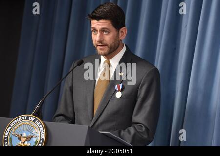 Reportage:  The speaker of the U.S. House of Representatives, Paul Ryan, speaks after receiving the Department of Defense Medal for Distinguished Public Service, at the Pentagon, Arlington, Va., Nov. 28, 2018. U.S. Secretary of Defense James N. Mattis presented the award to the Wisconsin lawmaker, lauding him for his public service and support of the U.S. military. Stock Photo
