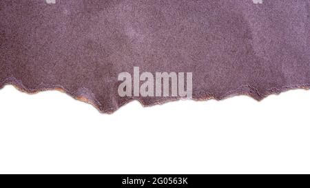Torn horizontal old brown paper with soft shadows for split text on a white background. Stock Photo