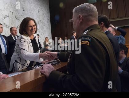 Reportage:  Chairman of the Joint Chiefs of Staff Army Gen. Mark A. Milley greets Senator Deb Fischer of Nebraska before the start of a defense budget posture hearing, Hart Senate Office Building, Washington, D.C., March 4, 2020. Stock Photo