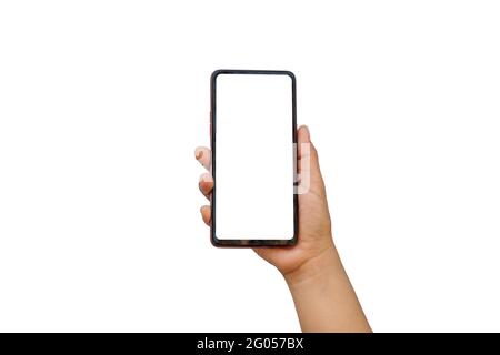 The hand is holding the white screen, the mobile phone is isolated on a white background with the clipping path. Stock Photo