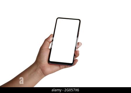 The hand is holding the white screen, the mobile phone is isolated on a white background with the clipping path. Stock Photo
