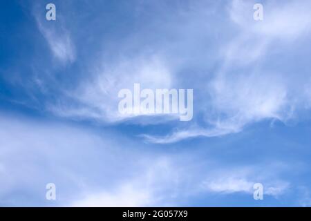 Blurred white clouds on the sky background. Stock Photo