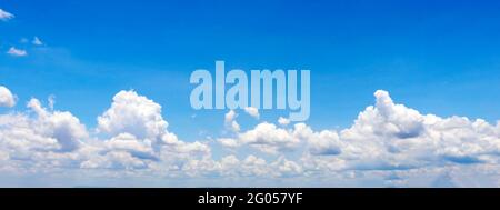 Cumulus white clouds floating in blue sky, concept for design to make wallpaper. Stock Photo
