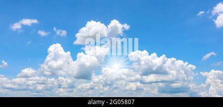 Cumulus white clouds floating in blue sky, concept for design to make wallpaper. Stock Photo
