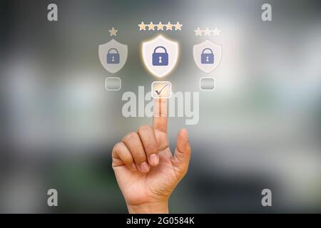 Business people click on the icon best protection for internet business and business security ideas. Stock Photo