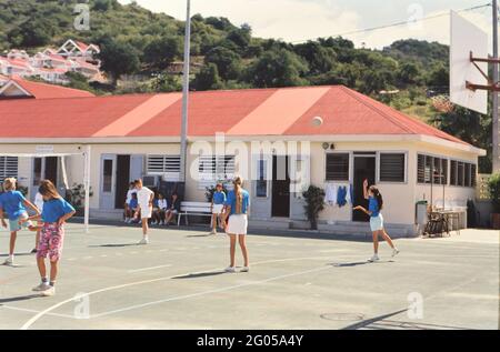 1990s St. Barts (Saint Barthélemy) – Young teens at play in public school playground (school yard) in Gustavia St. Barts ca. 1991 Stock Photo