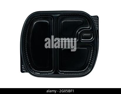 Top view takeaway food box on white background. Black colour takeaway plastic food box, four compartment separated, isolated image on white background Stock Photo