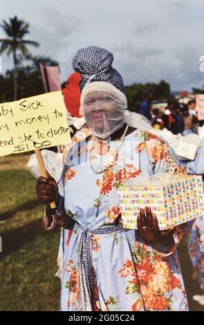 1990s Trinidad and Tobago - Tobago Heritage Festival performer begging for money to bury her baby ca. late 1990s Stock Photo