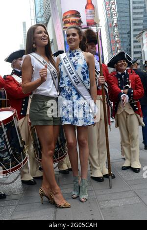 Reportage:   Miss USA Nia Sanchez and Miss Teen USA K. Lee Graham celebrate the US Army's 240th birthday in Times Square in 2015.The Army celebrates its 240th birthday with events in Times Square, New York, that included a performance by the Old Guard Fife and Drum Corps and an appearance by Miss USA and Miss Teen USA. Stock Photo