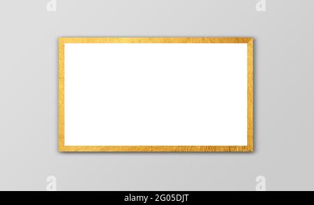 One Horizontal golden Picture frame. White Blank with gold Borders Hanging in Soft Grey Wall. 1 Foto Frame with golden Border. Photography Mockup Stock Photo
