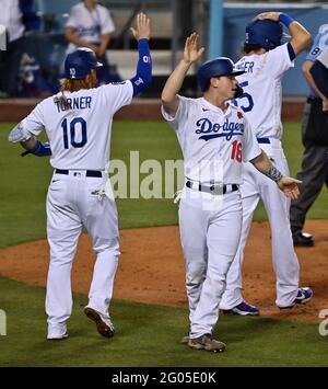 Los Angeles, United States. 01st June, 2021. Los Angles Dodgers Justin Turner, (10) Will Smith (16) and Cody Bellringer (35) celebrate after scoring on Chris Taylor's 14-pitch, bases-clearing double in the sixth inning to help propel the Dodgers to a 9-4 win over the St. Louis Cardinals at Dodger Stadium on Monday, May 31, 2021. Photo by Jim Ruymen/UPI Credit: UPI/Alamy Live News Stock Photo