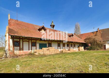 Abandoned old building of farm called 'Alter Gutshof Am stillen Meiler'. A former farm located next to closed down power plant in Philippsburg Stock Photo